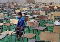 A student awaits classes to begin in a sanctioned Afghan school (file photo) (epa)