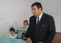 Education Minister Abdujabbor Rahmonov has taken a hard line on outward signs of faith