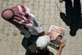 Reading news of the death of Abu Musab al-Zarqawi, leader of Al Qaeda in Iraq (AFP)