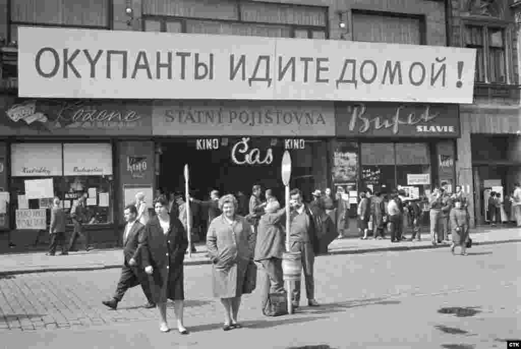 A Russian-language banner in the city of Plzen, in western Czechoslovakia, reads "Occupiers Go Home."