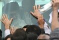 Ayatollah Ali Khamenei, Iran's supreme leader, waves to a crowd through the windows of his car (Fars)