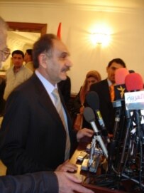 Salih al-Mutlaq speaking to reports after talks with other political leaders in Baghdad in February (epa)