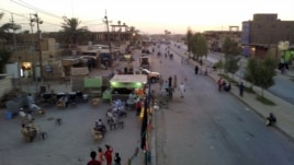 The outskirts of Karbala on July 6, with small numbers of pilgrims gathered