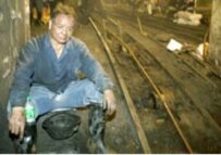 A miner rests during the Daxing rescue effort (file photo)