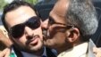 Muntadhar al-Zaidi (left) is welcomed by supporters in Baghdad after his release from prison in September 2009.