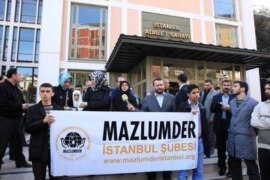 Turkey - Guldan Sonmaz, Head of Istanbul Branch of Mezlumder HR Group making a speech druing a rally.