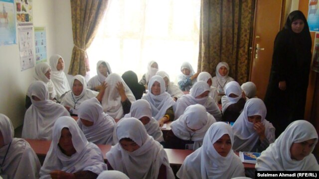 A gathering of recruits at a new Afghan women's association training center in Kabul in May.