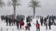 Croatia -- People walk along a snow covered street at Adriatic city of Split, 03Feb2012
