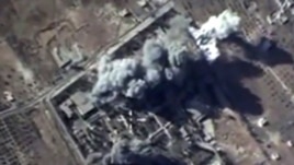 Кадр видео, опубликованного министерством обороны России, на котором запечатлены удары российской авиации по объектам в Сирии. 12 октября 2015 года.