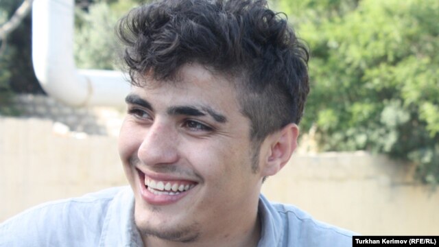 Azerbaijani photographer Mehman Huseynov after his release on June 13