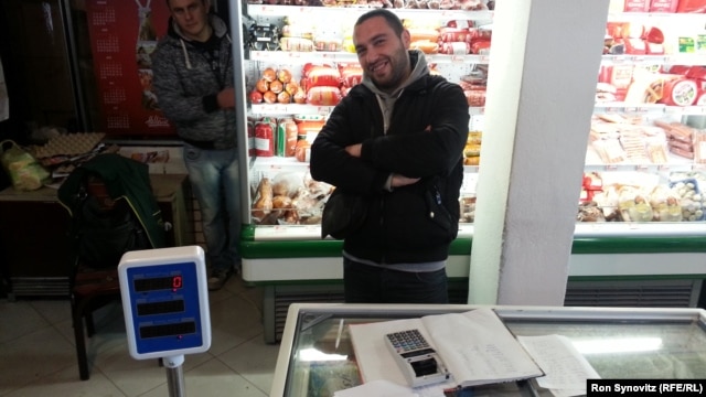 Aleksandar Josifovic, a Serb with a computer-science degree, can only find work at his father’s grocery store in Gracanica.