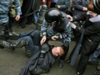 Police detain a marcher in St. Petersburg on March 3 (TASS)