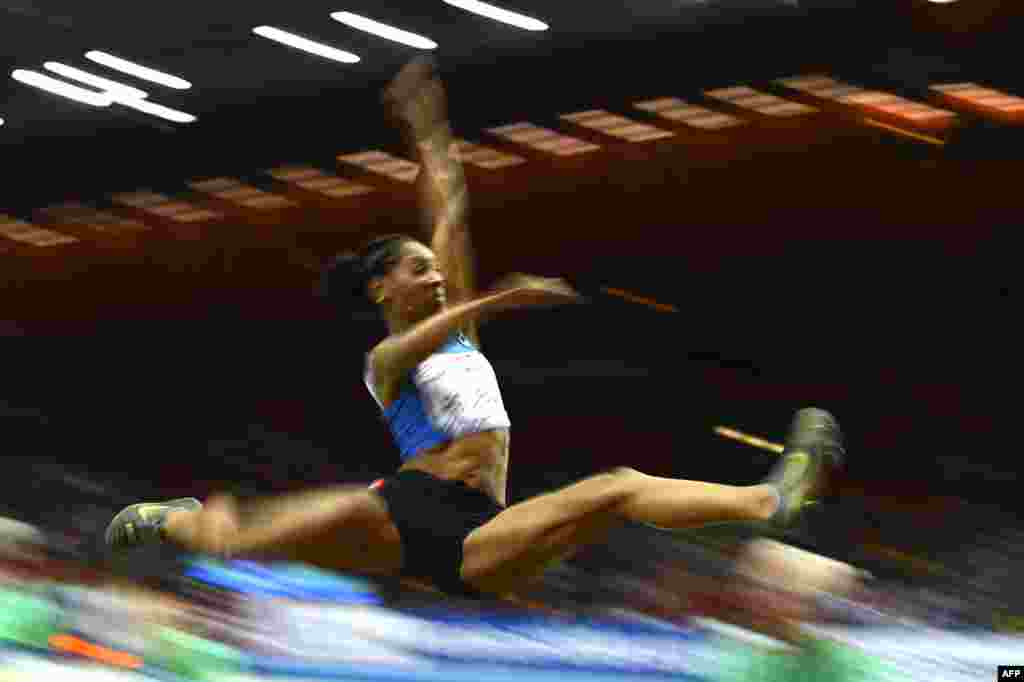 France's Eloyse Lesueur competes during the women's long jump final at the European Indoor Championships in Gothenburg, Sweden. (AFP/Adrian Dennis)