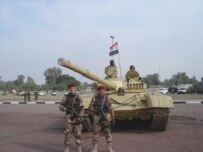 Odierno hopes Iraqi troops will soon be controlling Baghdad (file photo) (RFE/RL)
