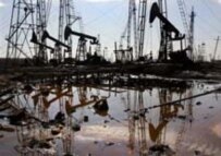 Oil derricks in the Caspian Sea near the Azerbaijani capital, Baku (file photo) (AFP)