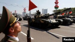 The European Commission has denied a newspaper story that EU aid money is being used to prop up Belarusian security forces.