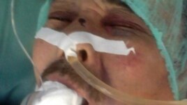 Базарбай Кенжебаев Жаңаөзен қаласының уақытша оқшаулау изоляторында алған соққылардан қайтыс болған. Жаңаөзен, желтоқсан 2011 жыл.