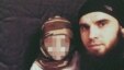 Abu Umar Grozny, the Chechen commander of Islamic State's North Caucasian battalion, holds a child in one of his social-media postings.