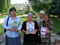 Relatives of some of those killed at a protest in June (RFE/RL)
