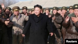 The trip would be the first foreign visit by North Korean leader Kim Jong Un (center), 31, since he assumed leadership of the isolated and tightly controlled East Asian state in 2011.
