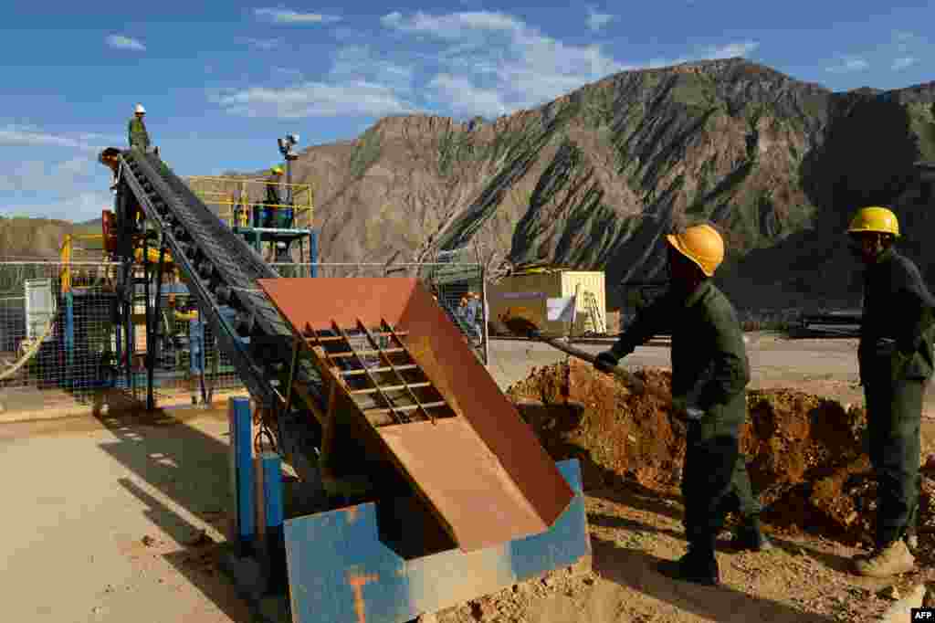 Miners use modern equipment as part of the rapidly developing mining operations. International companies such as J.P. Morgan Capital Markets are investing in mineral extraction in the region.