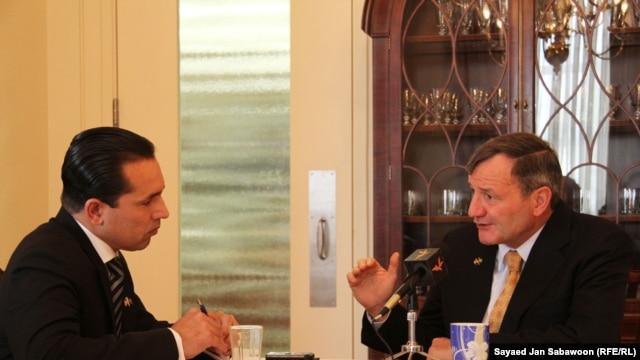 Karl Eikenberry, the outgoing U.S. ambassador for Afghanistan, speaks during an exclusive interview with Rahimullah Samandar, the bureau chief of RFE/RL's Radio Free Afghanistan, in Kabul on July 14.