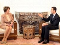 Pelosi (left) with President al-Assad in Damascus today (epa)