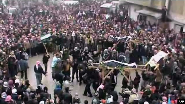 A video grab shows the funeral of people killed in Maaret al-Noman in the flashpoint northern Idlib province.