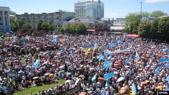 Crimean Tatars commemorate the 65th anniversary of the mass deportation in Simferopol on May 18.