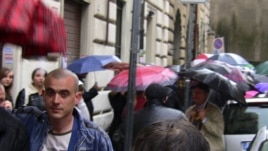 Migranți din Italia