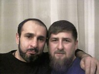 Baisarov (left) with Chechen Prime Minister Ramzan Kadyrov in an undated file photo (ITAR-TASS)
