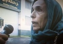 A television shot of Esfandiari in front of Evin prison after her release (AFP)