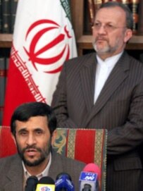 President Ahmadinejad (seated) has called the Holocaust \