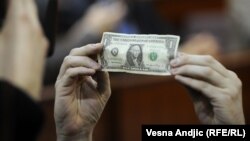 The U.S. State Department's annual "International Narcotics Control Strategy" report is delivered to Congress each year as part of an effort to protect the dollar.