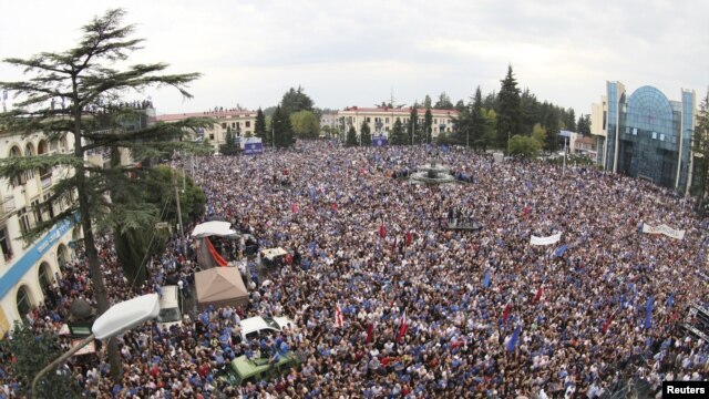 Thousands of people attend an election rally in support of the opposition bloc Georgian Dream in Zugdidi on September 22. 