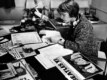A broadcaster prepares a music program, 1960s. Banned cultural offerings have always been a part of RFE\'s programming.