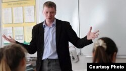 Russian history teacher Mikhail Kopitsa has been reprimanded for trying to "counter the flood of propaganda coming from the media."
