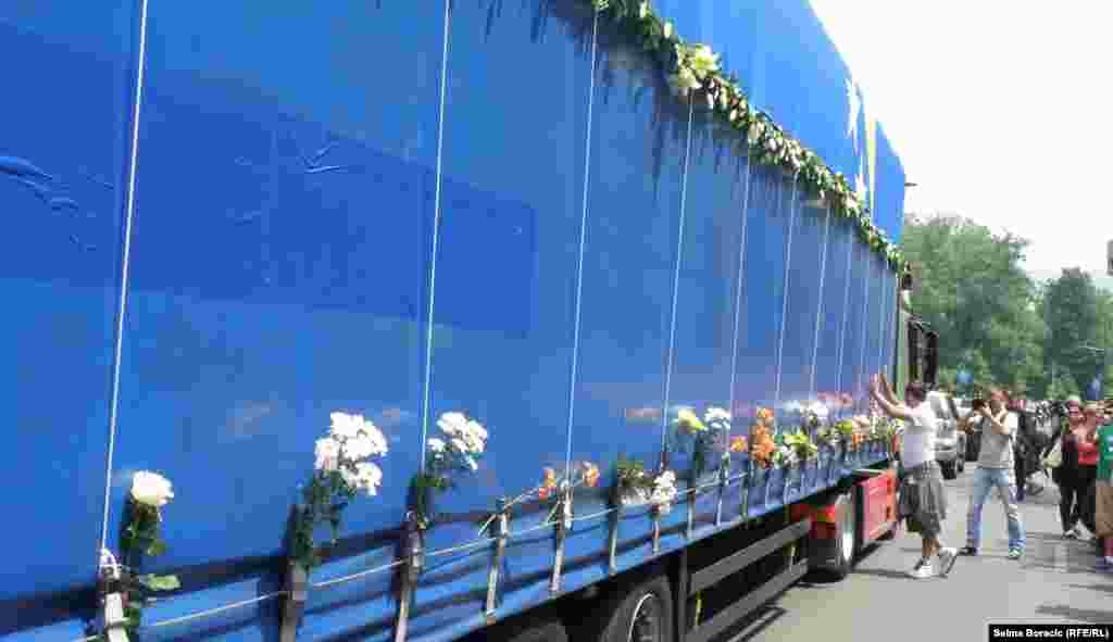 Flowers placed on the trucks by well-wishers.