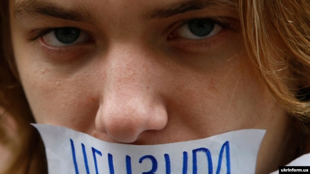 An activist protests censorship in Ukraine. (file photo)