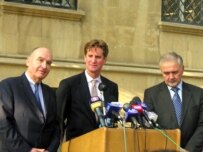 Fassier (left) with Merzlyakov (right) and U.S. coChairman Matthew Bryza in Baku last year (RFE/RL)