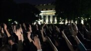 Russian demonstrators vote as they take part in a permanent protest gathering against the presidential inauguration of Vladimir Putin at a protest camp named 'OccupyAbai' in Moscow.