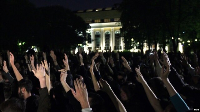 Protesters vote to stay in place during an "Occupy-style" protest in Moscow on May 15.