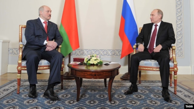 Russian President Vladimir Putin (right) meets with his Belarusian counterpart Alyaksandr Lukashenka in St. Petersburg on March 15. 
