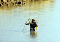 An Afghan fisherman tries his luck on the Amu Darya, which forms the border between Afghanistan and Uzbekistan (file photo) (epa)