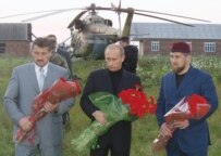 Putin (center) visiting Chechnya in 2004 with pro-Kremlin Chechen President Alu Alkhanov (left) and Chechen First Deputy Prime Minister Ramzan Kadyrov (TASS)