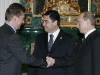 Putin (right) meets with Turkmen President Berdymukhammedov (center) and Gazprom CEO Aleksei Miller in the Kremlin in April (TASS)