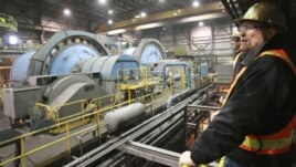 John Pearson, Centerra Gold company's Vice President Investor Relations, looks on at the gold-mining plant at the Kumtor mine.