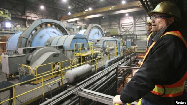 John Pearson, Centerra Gold company's Vice President Investor Relations, looks on at the gold-mining plant at the Kumtor mine.
