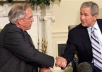 Porter Goss (left), the former CIA chief, resigned on May 5 (AFP)