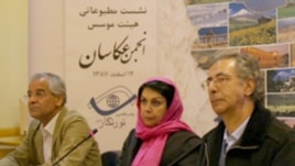 Maryam Zandi (center), the head of the National Society of Photographers